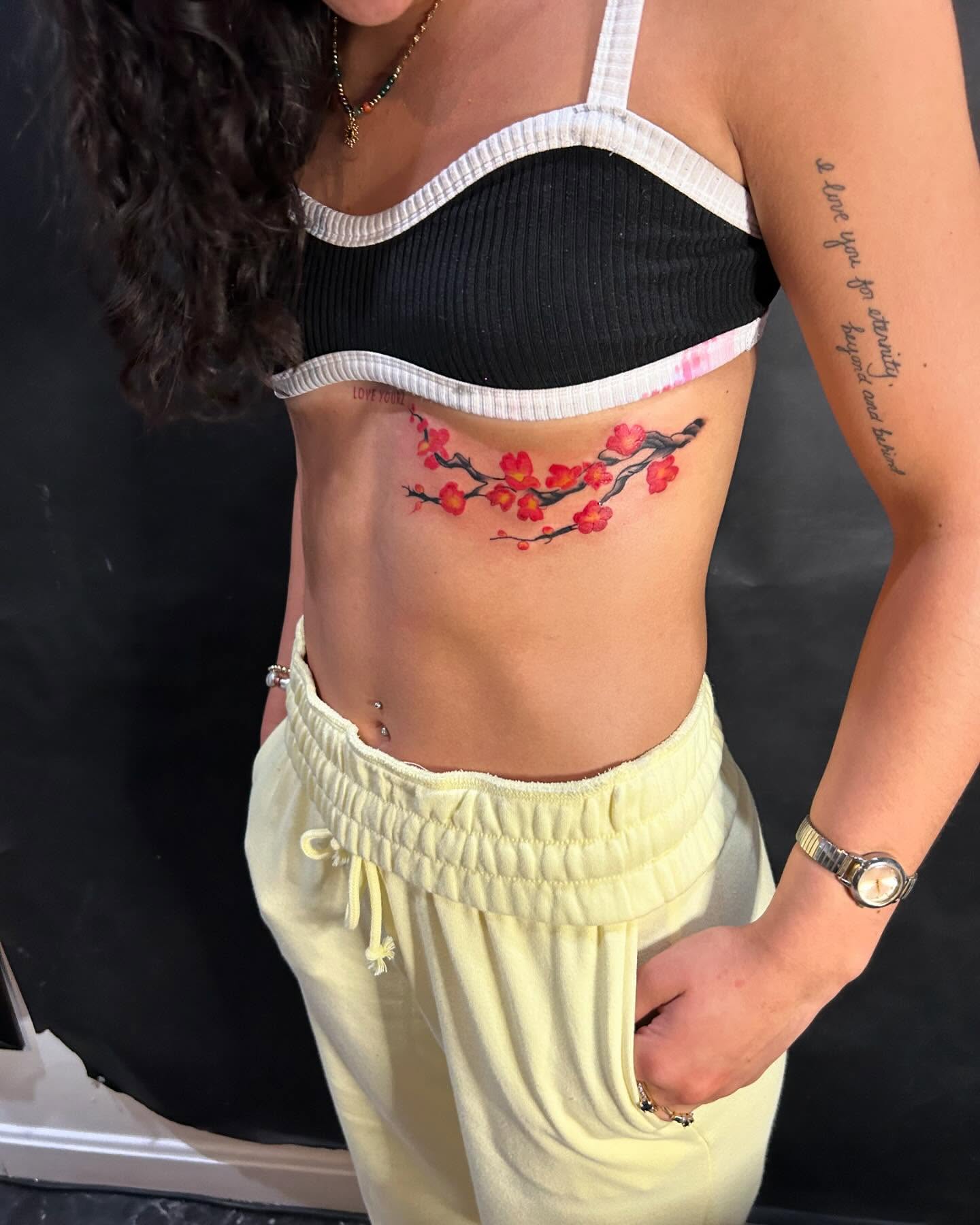 Cherry blossoms dotwork tattoo on the torso by Joey-tattoo Artist