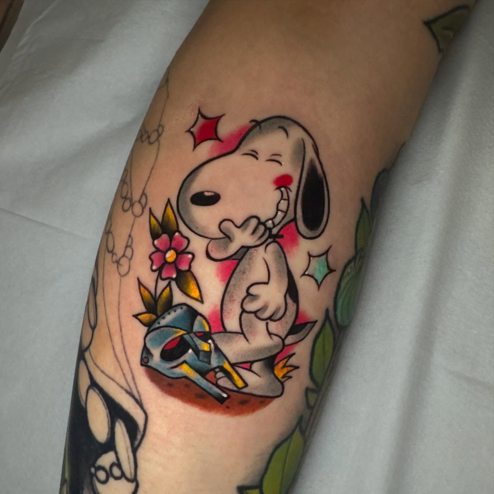 Snoopy American traditional tattoo on the forearm by Bruce becerra tattoos