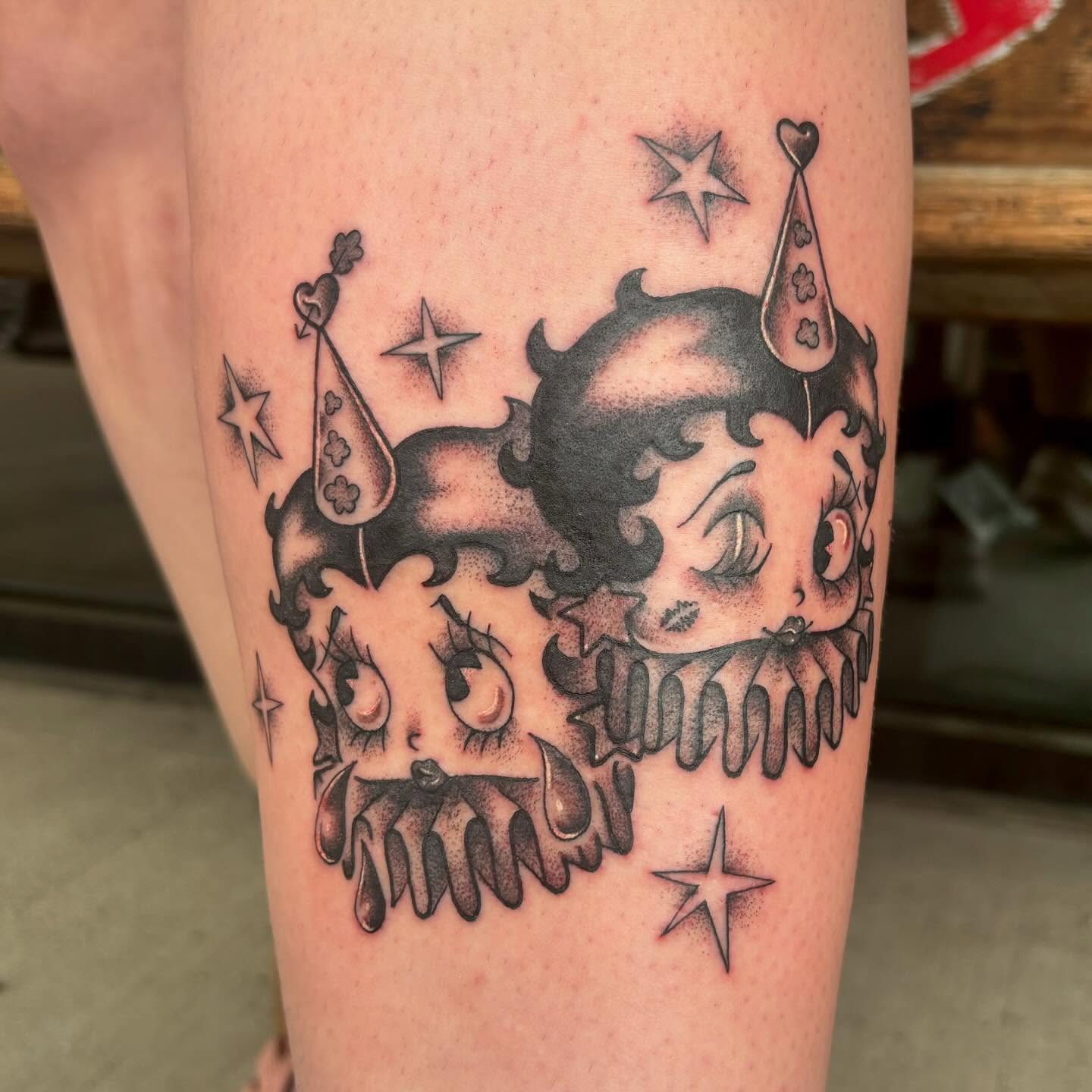 Betty Boop American traditional tattoo on the thigh by Jordan Wray