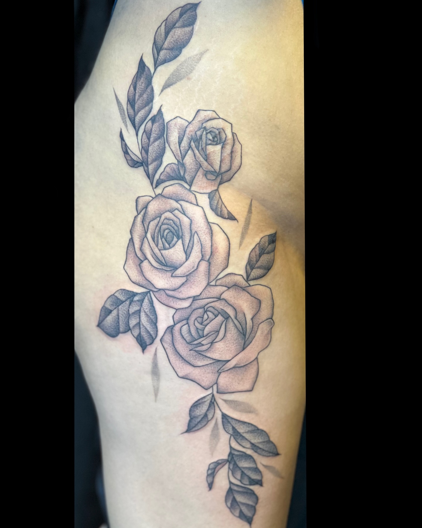 Roses dotwork tattoo on the thigh by Dani McBay