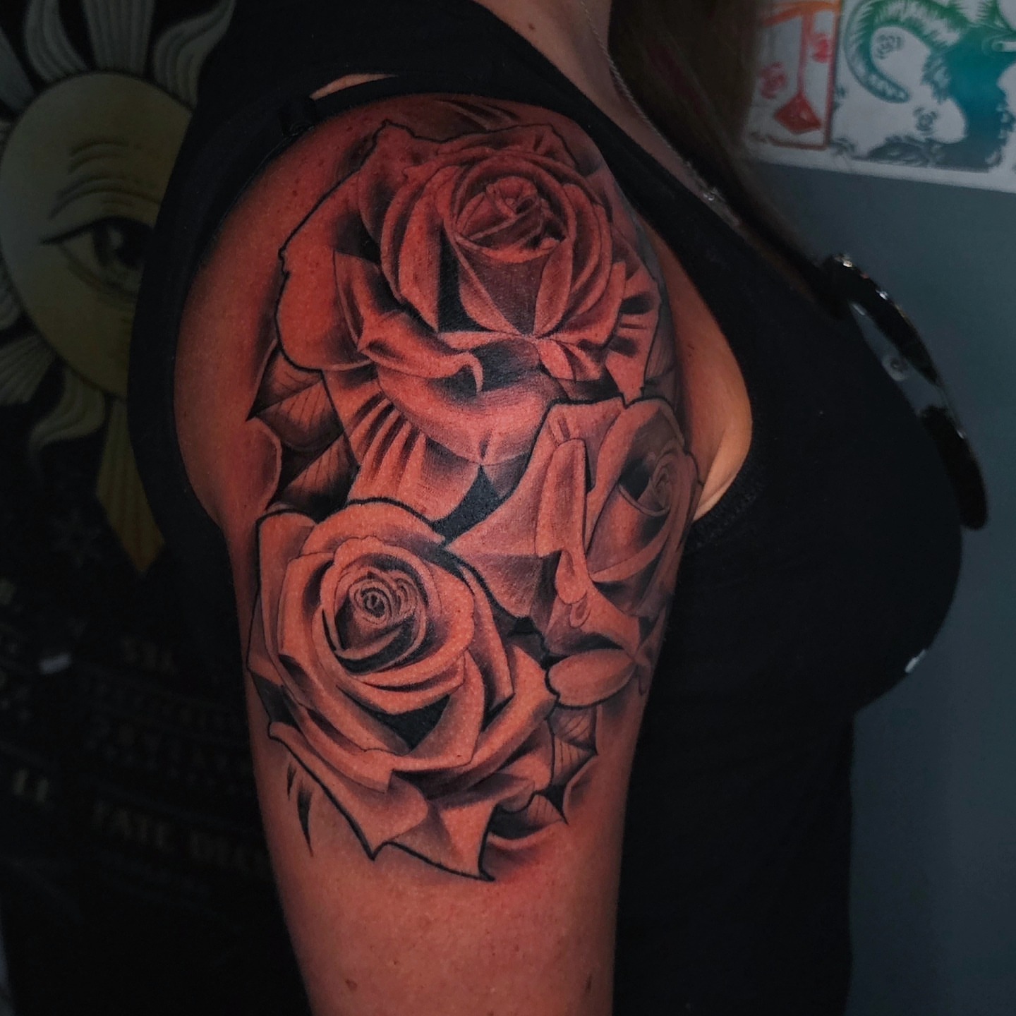 Roses black and grey tattoo on the shoulder by Christian Mulvey