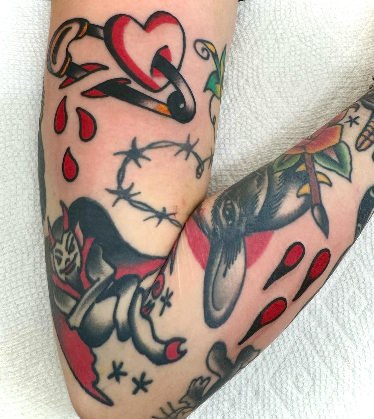 Heart and devil American traditional tattoo on the forearm by Nicholas Mella, Nashville, Tennessee