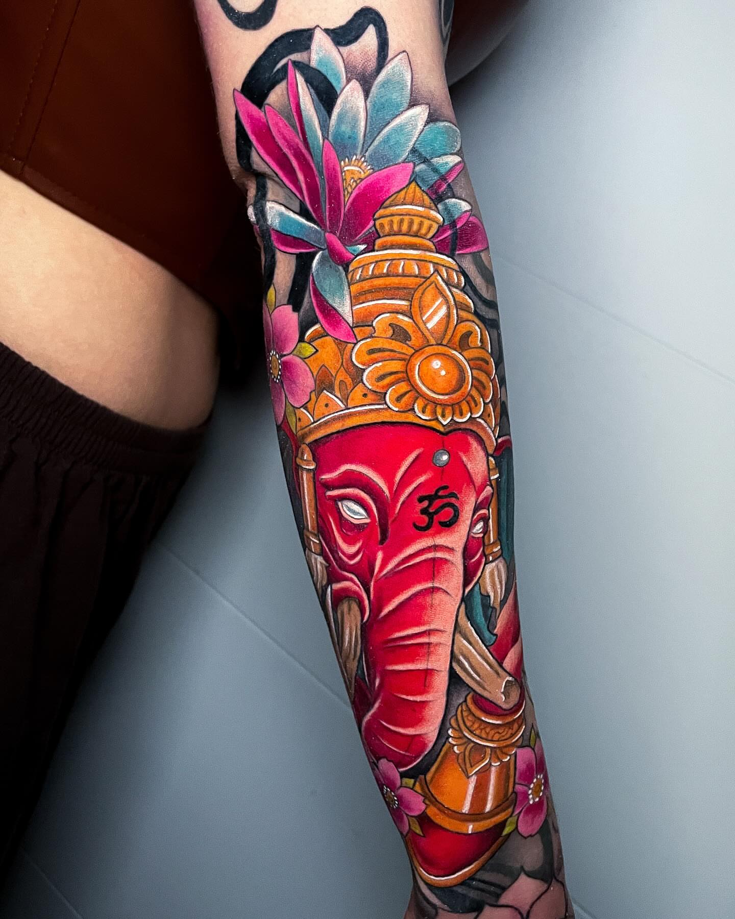 Ganesha head American traditional tattoo on the forearm by Christian Pelaez