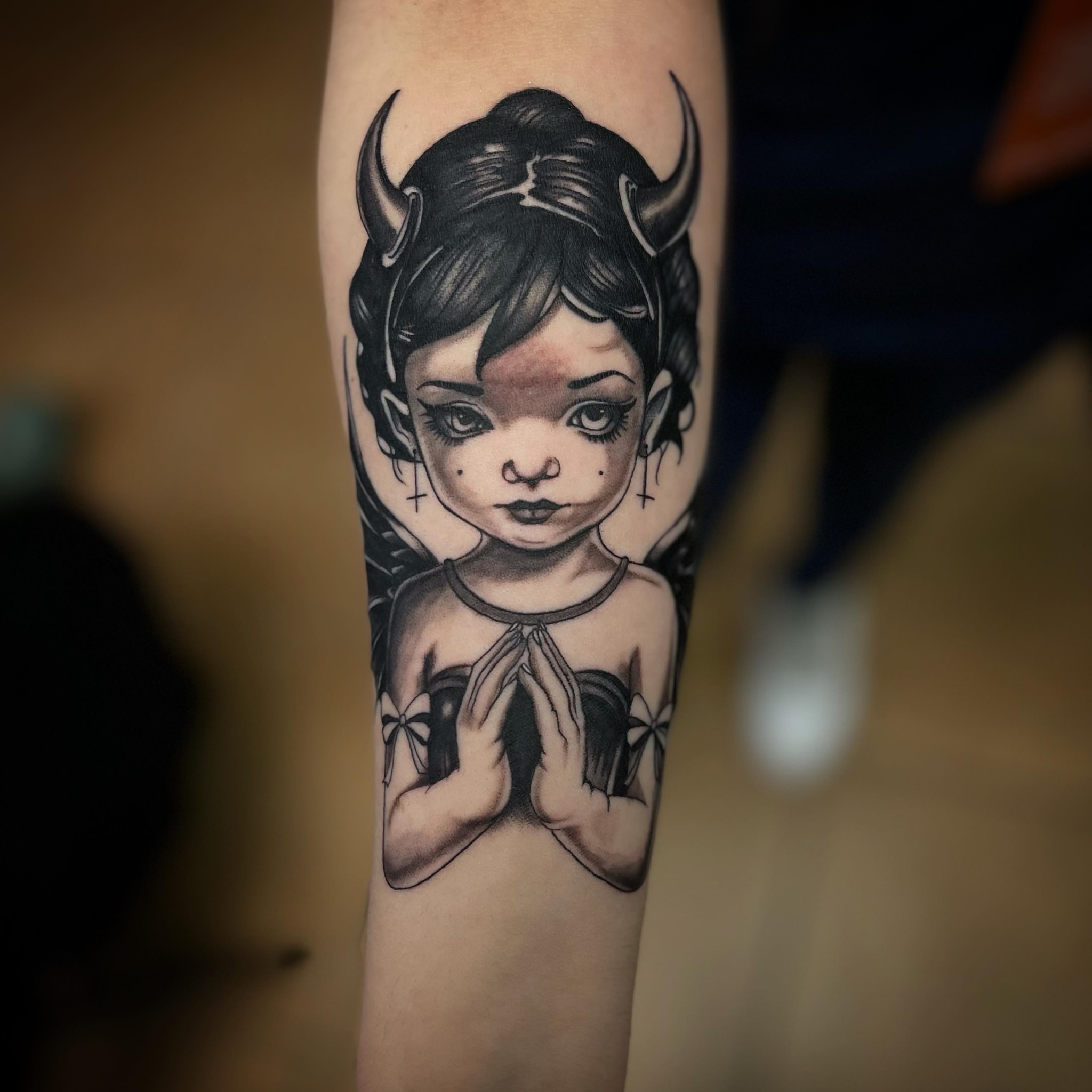 Praying child realism tattoo on the forearm by @tattoos_by_elijah