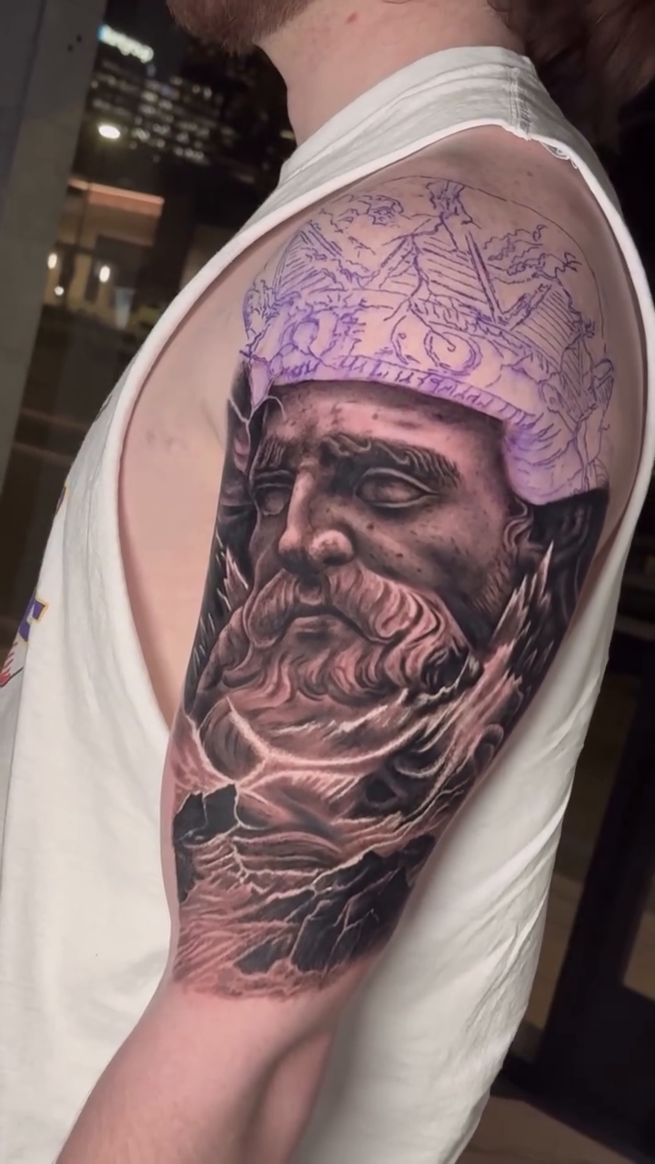 Bust of a bearded man realism tattoo by Michael Sosa