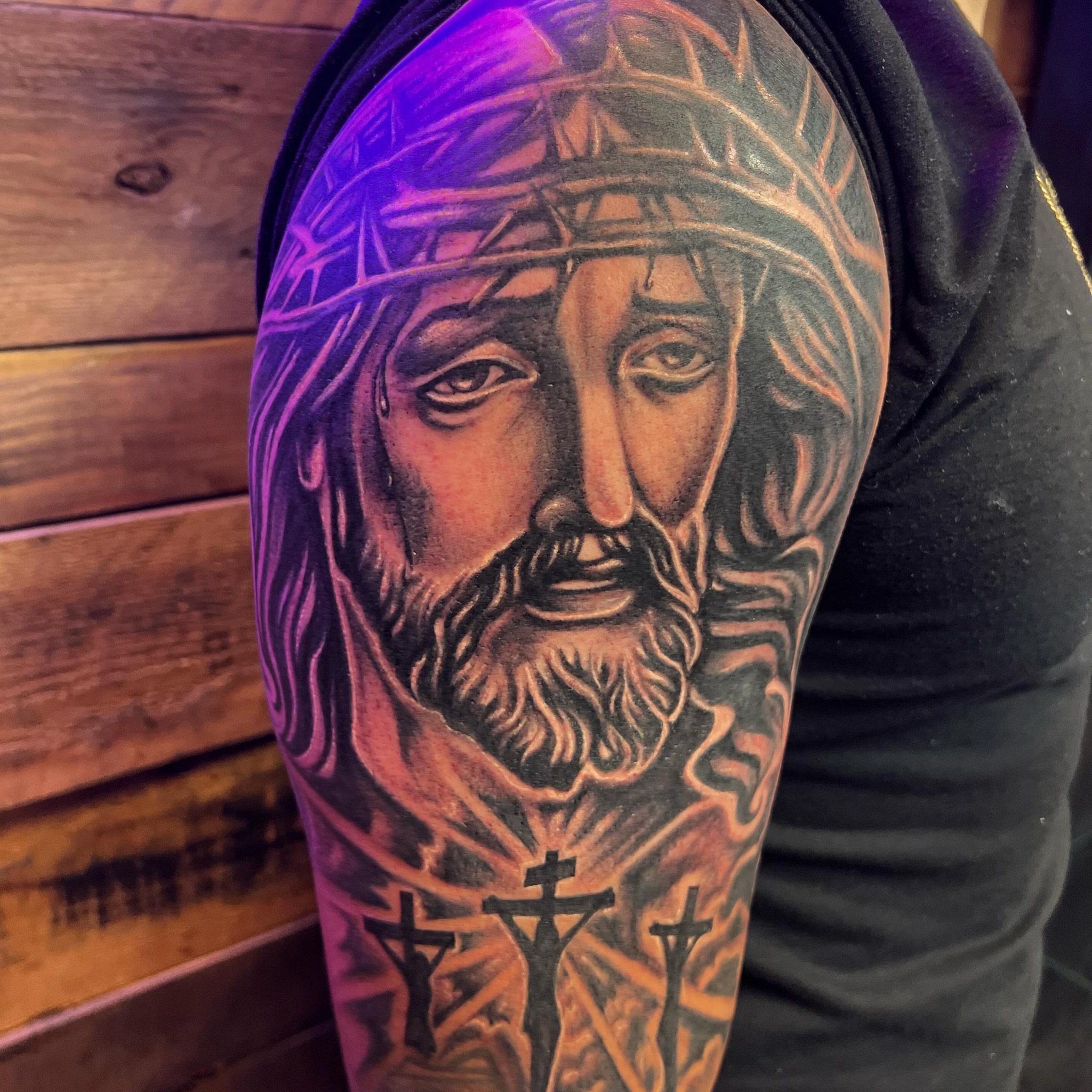 Religious figure realism tattoo on the forearm by Summer Rain