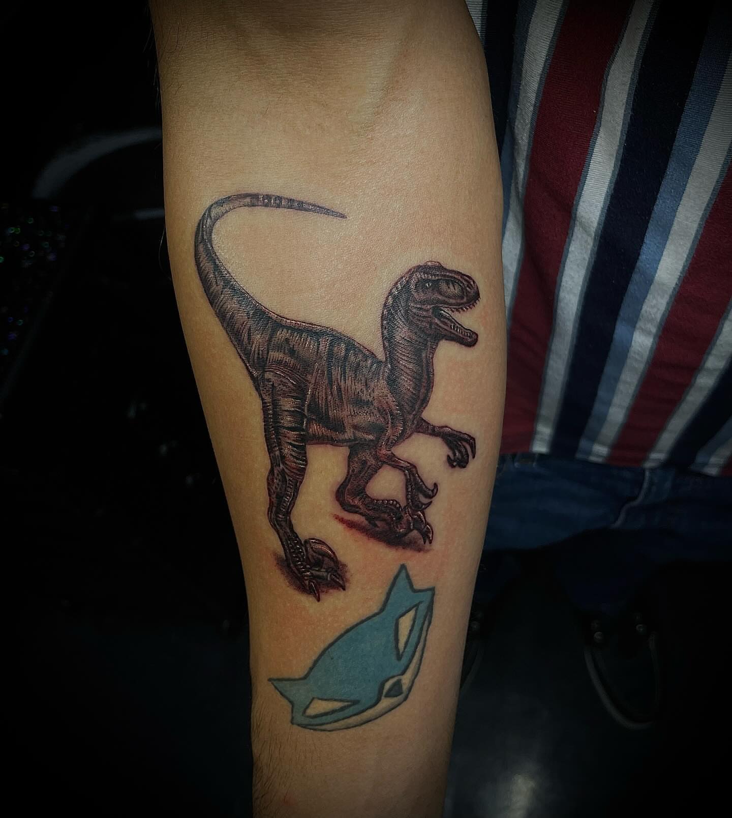Dinosaur black and grey tattoo on the forearm by Las Vegas Tattoo Artist