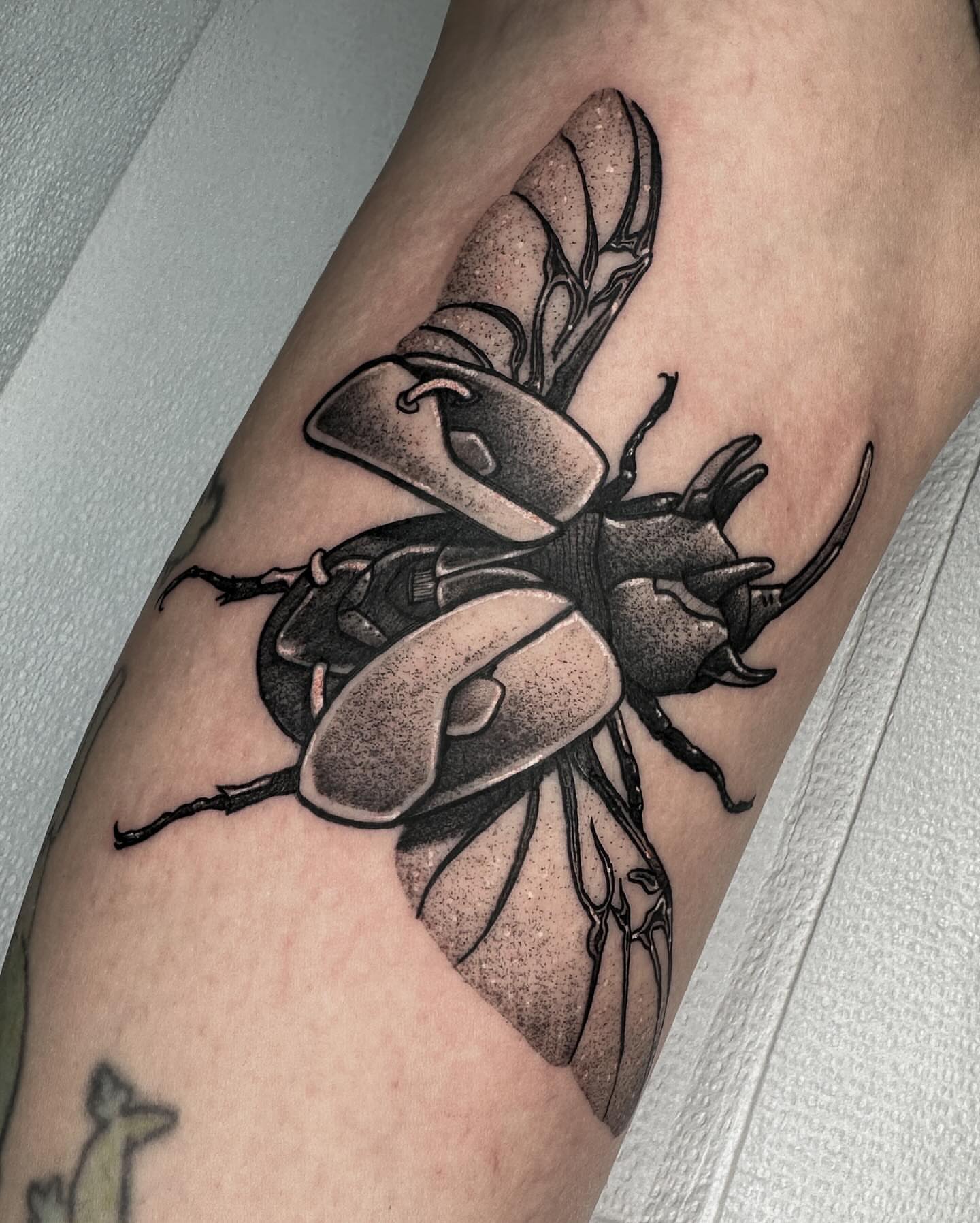 Tattoo by @doomedtattoo — dotwork
