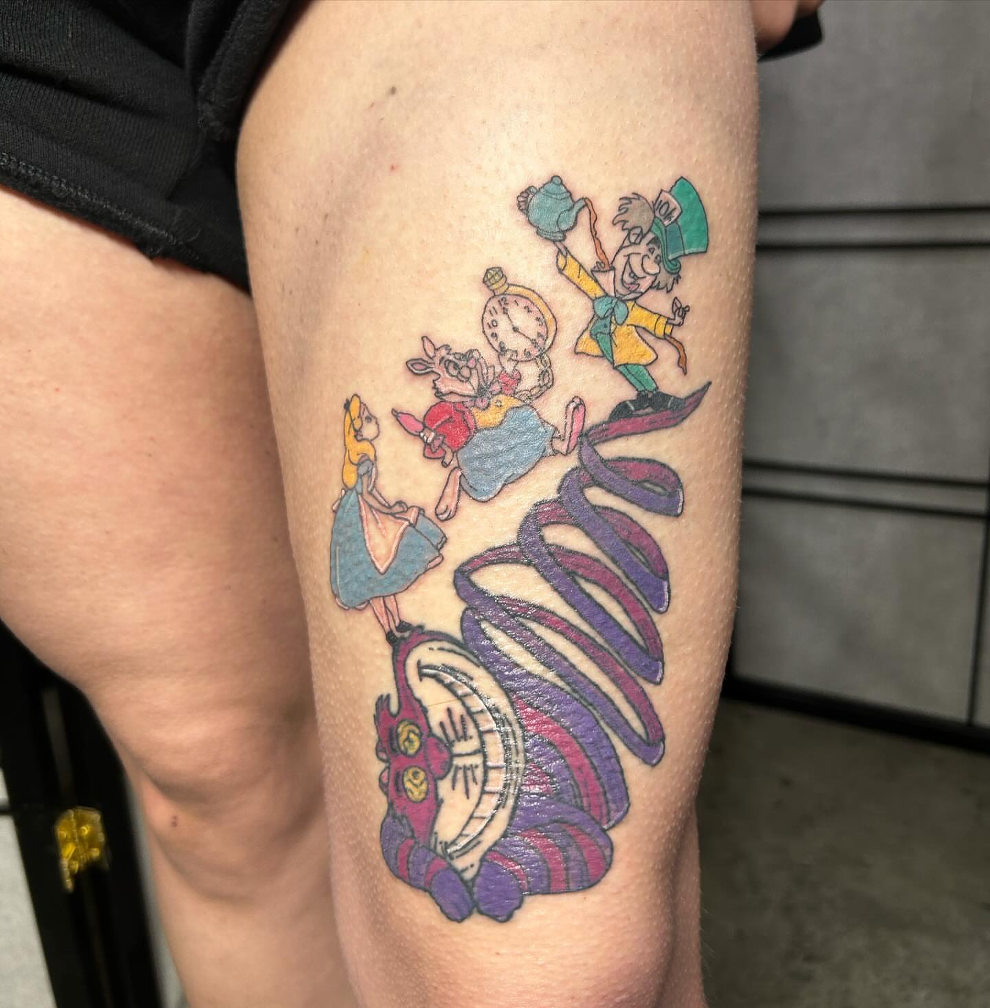 Alice in Wonderland characters new school tattoo on the thigh by goose 🪿