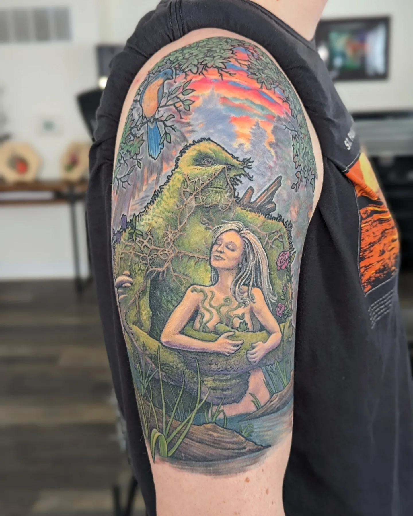 Forest spirit and woman realism tattoo on the upper arm by Jay Trip