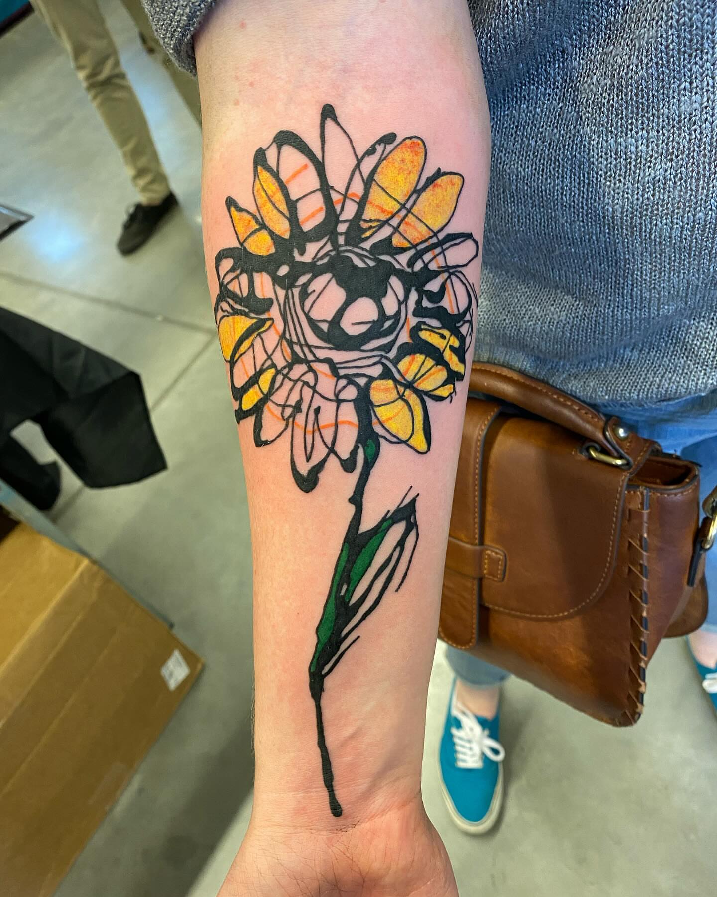 Sunflower new school tattoo on the forearm by Keith Cromie