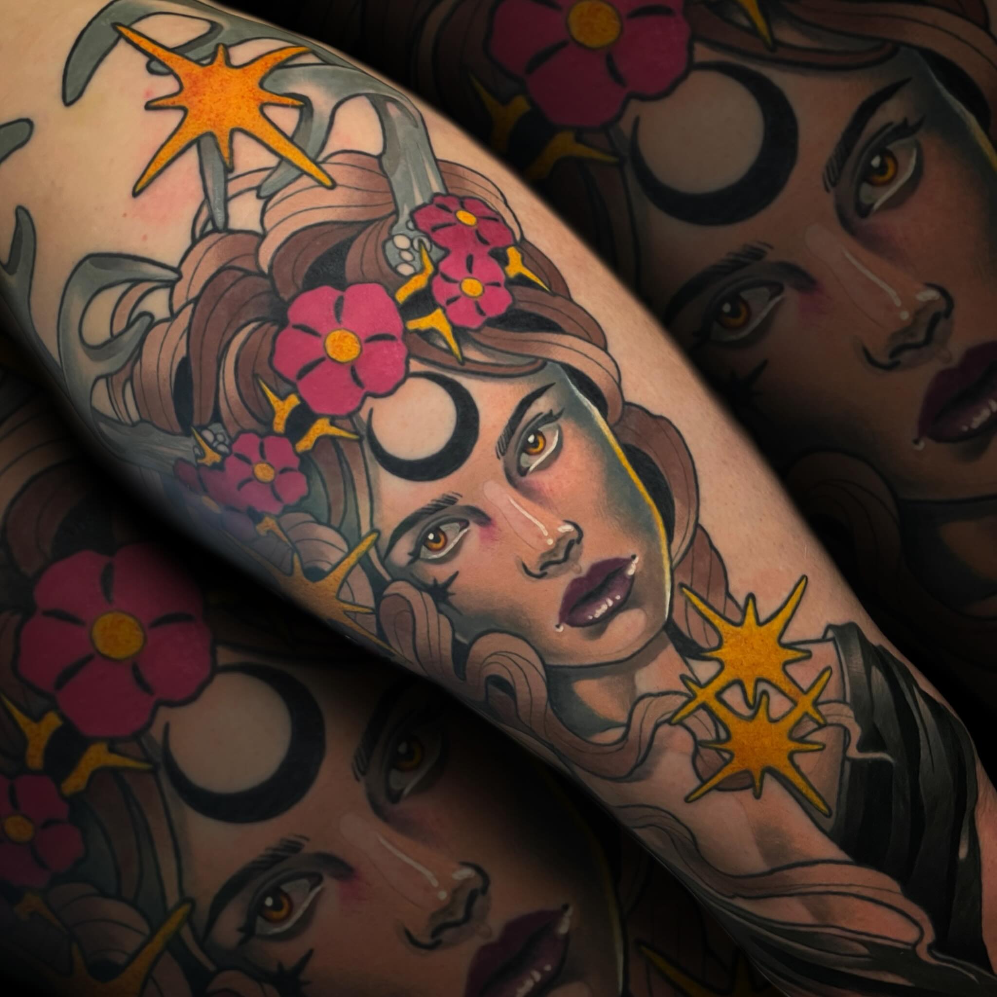 Woman with flowers American traditional tattoo on the forearm by Nathan Mickle