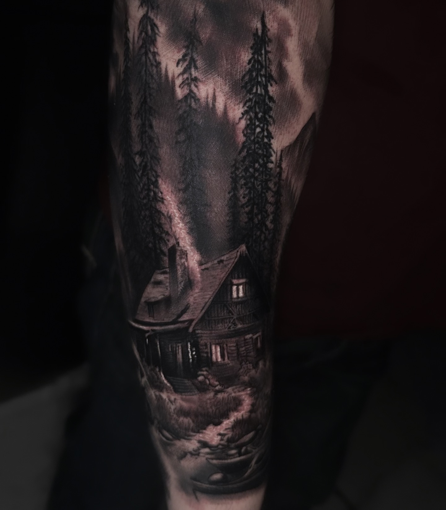 Haunted house dark realism tattoo on the forearm by Tattoos By Chino