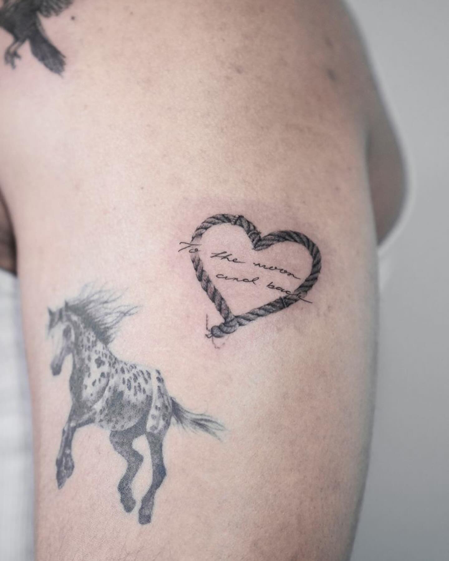 Heart with rope black and grey tattoo on the upper arm by Tattoo artist LA ། Fine line, Micro realism