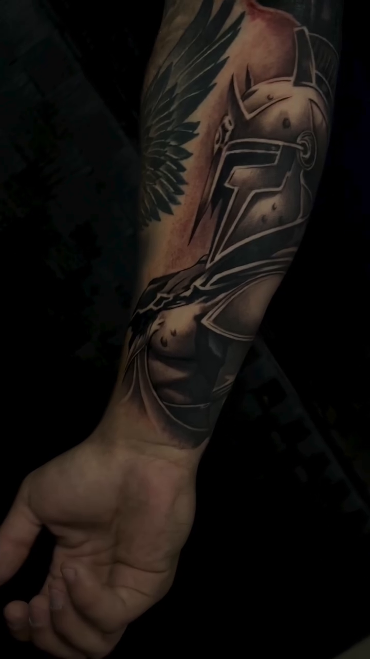 Spartan helmet realism tattoo by Anthony Coleman, Midland, Texas