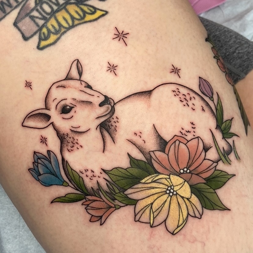 Deer and flowers American traditional tattoo on the thigh by Alicia