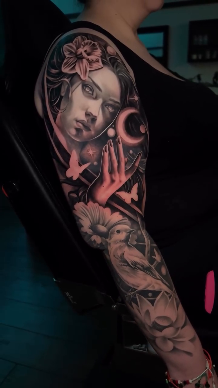 Woman with flower and celestial elements realism tattoo by 𝐉𝐨𝐧 𝐒𝐚𝐧𝐭𝐨𝐬