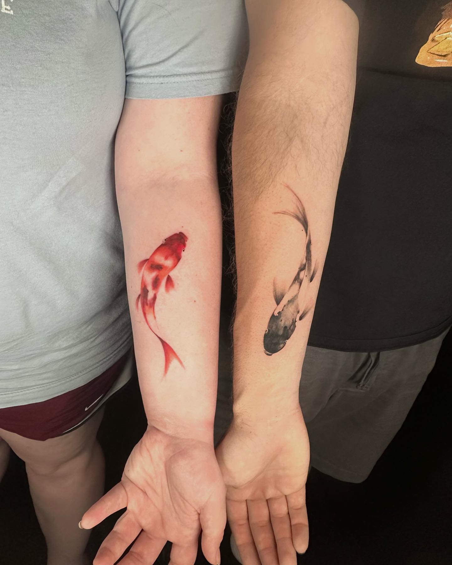Fish watercolor tattoo on the forearm by Alice Li, Houston, Texas