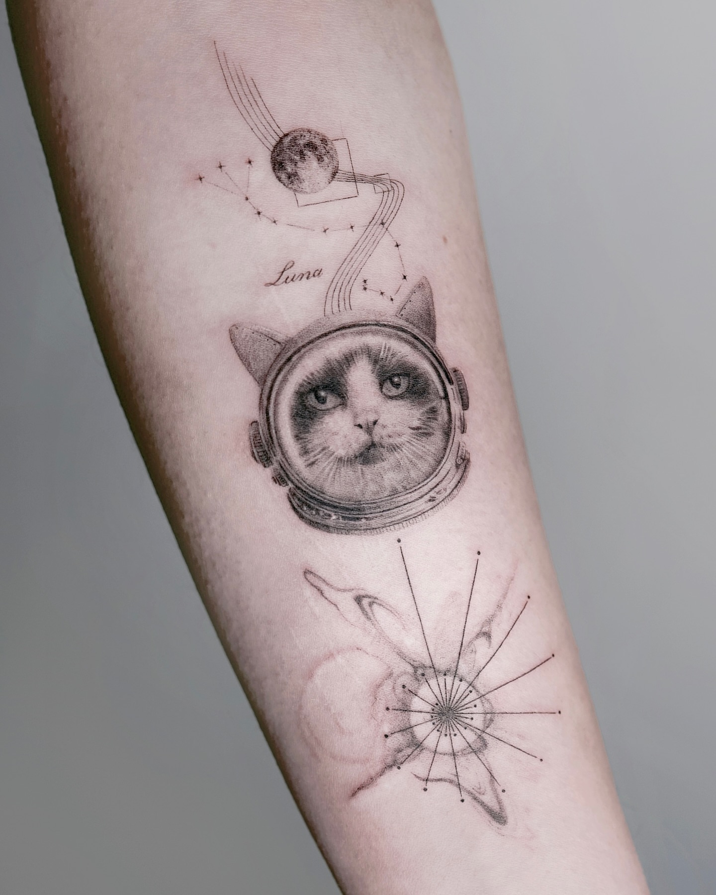 Cat in space helmet realism tattoo on the forearm by Tattoo artist LA ། Fine line, Micro realism