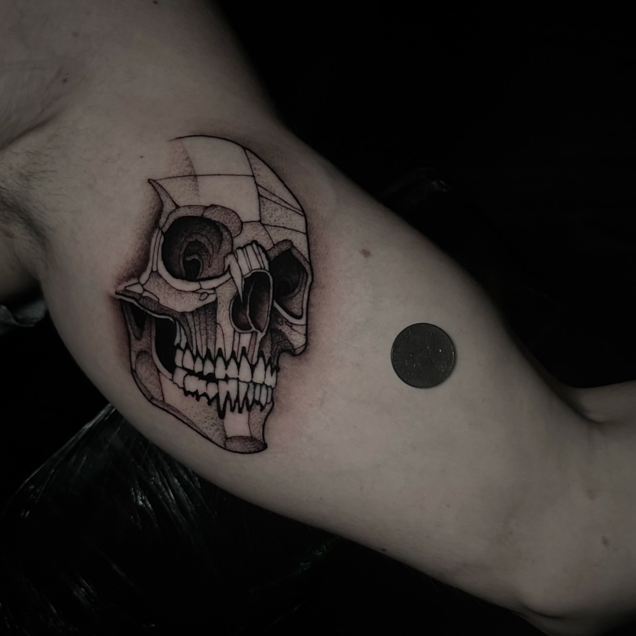 Skull realism tattoo on the forearm by Clayton Smith (BEAR)
