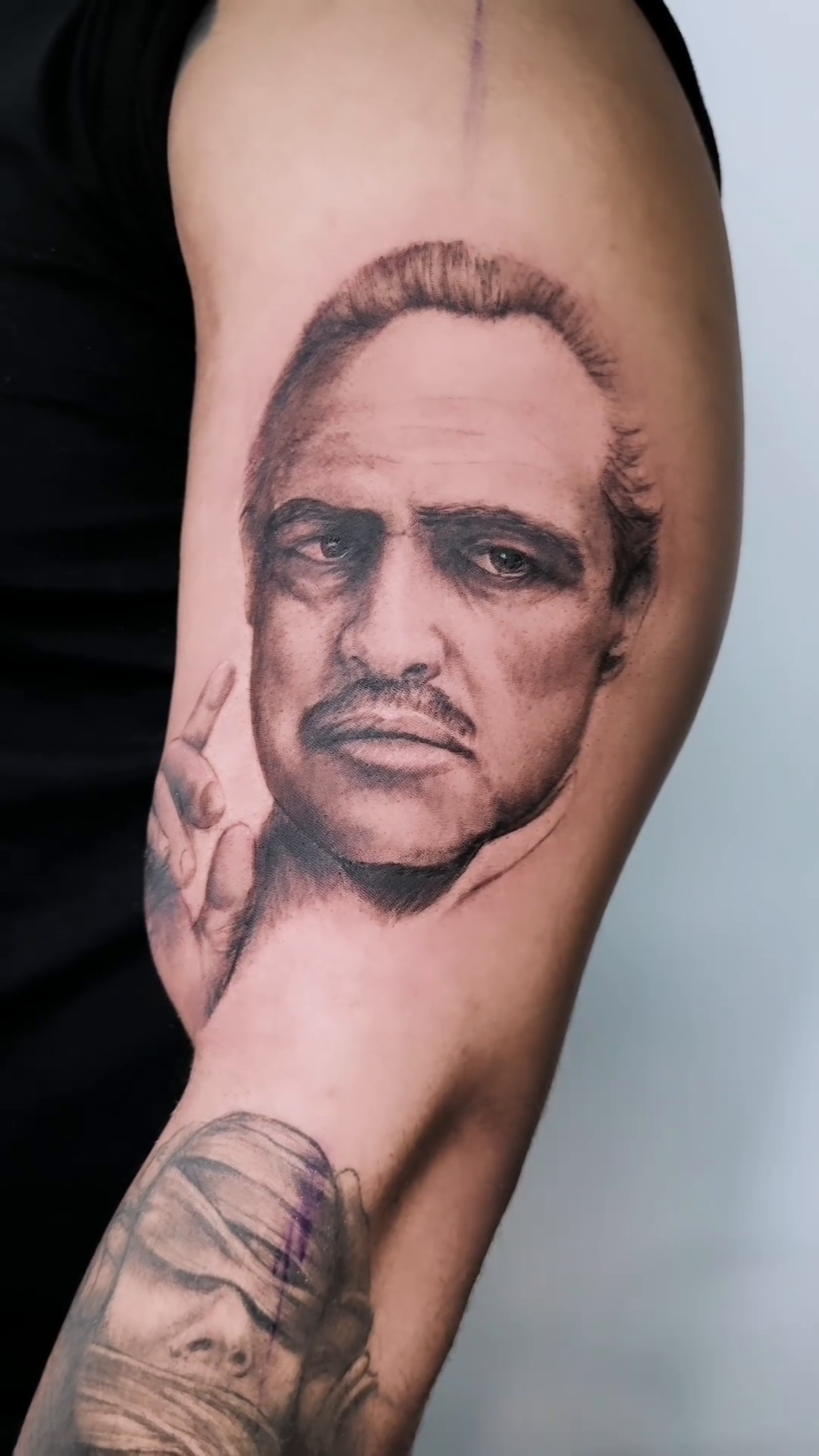 Marlon Brando as The Godfather realism tattoo by Ivan Grinevich