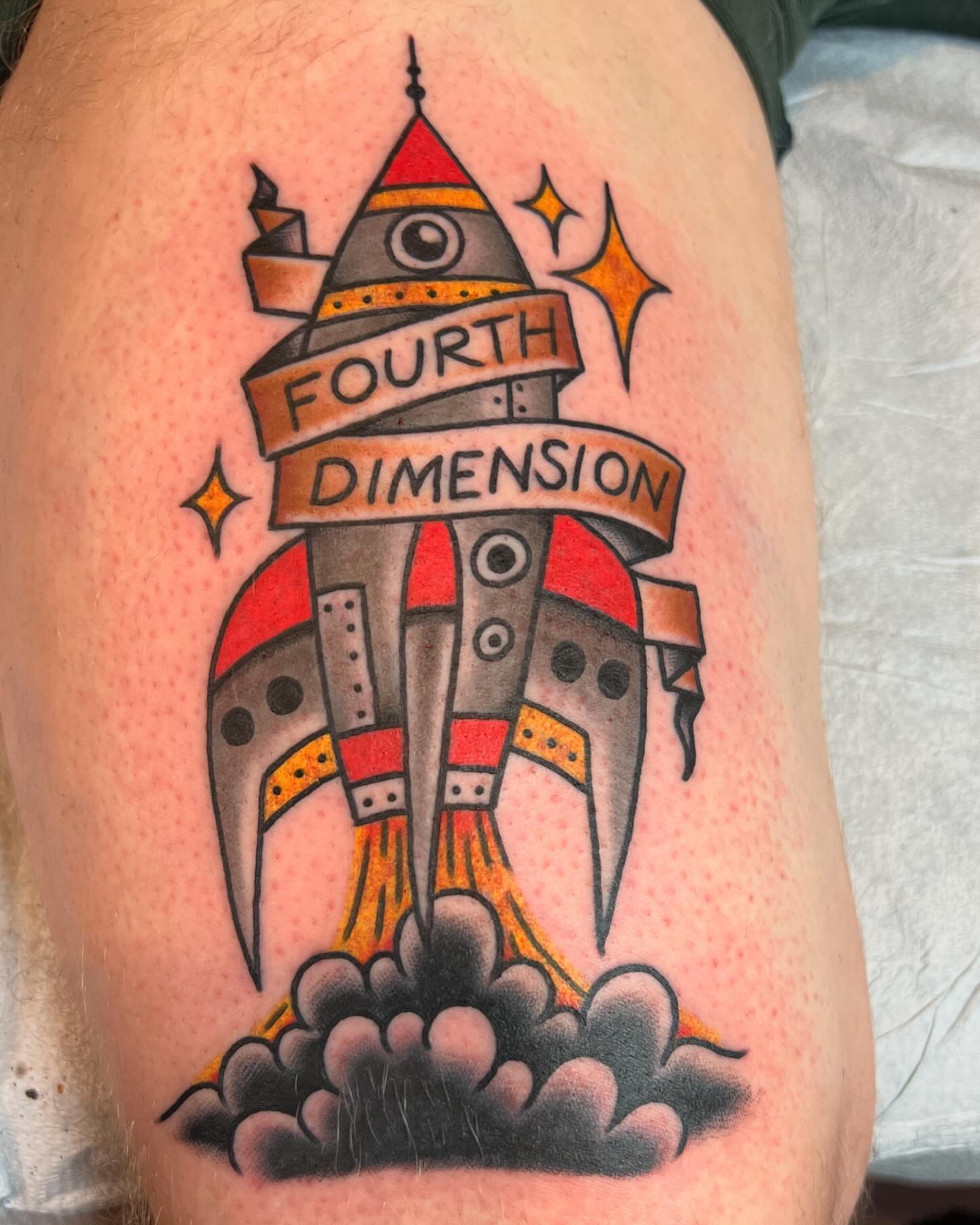 Rocket American traditional tattoo on the thigh by Ross K. Jones Tattoos, San Francisco, California