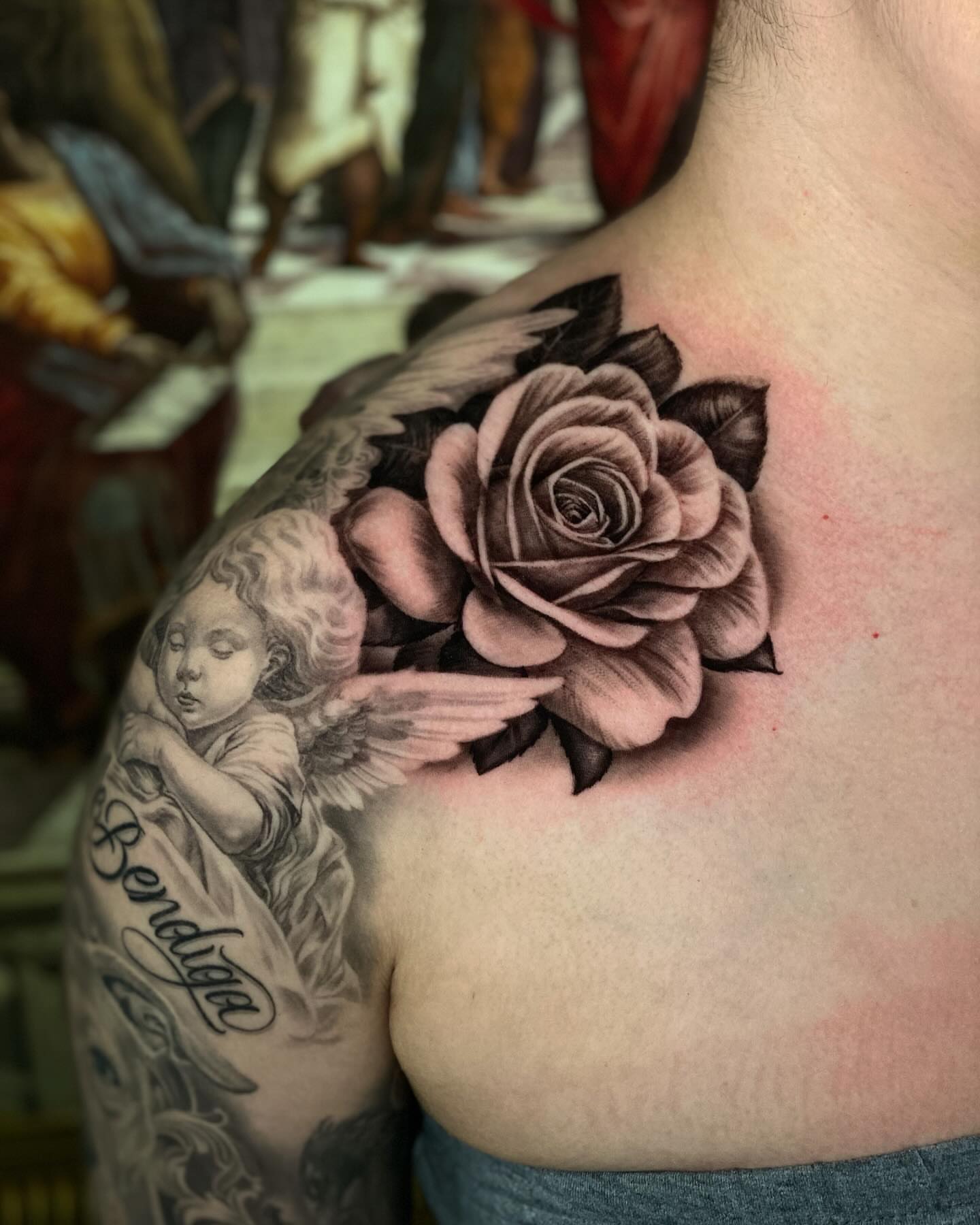 Rose realism tattoo on the chest by Sergio Mendez