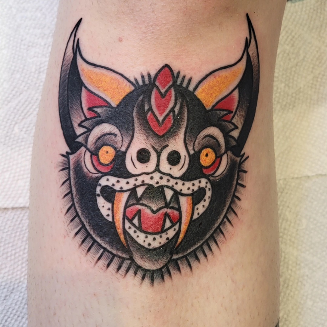 Demon mask American traditional tattoo on the forearm by BZ Artistry
