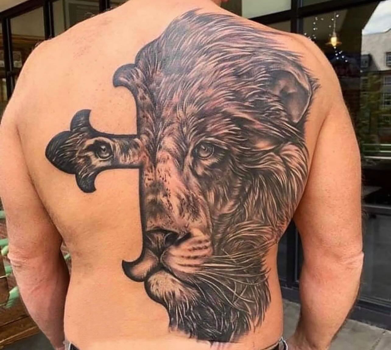 Tattoo by @tattoosbywoody — realism, black_and_grey