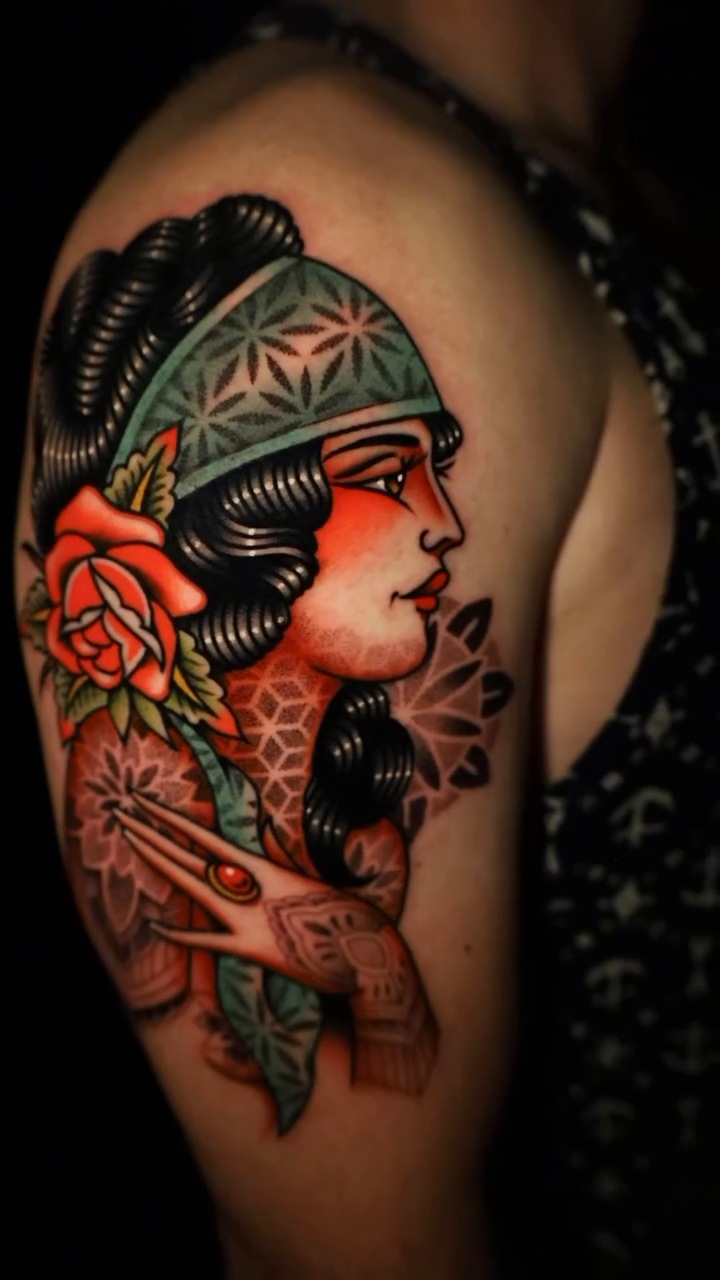 Woman with rose American traditional tattoo by Jason Call