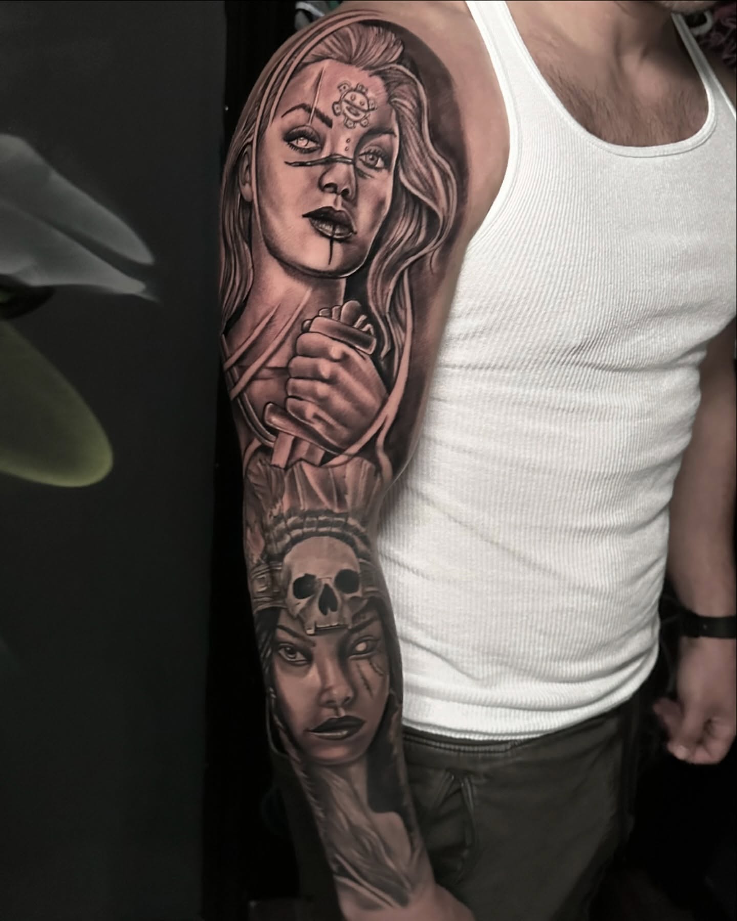 Woman with dagger realism tattoo on the forearm by Tattoo Artist