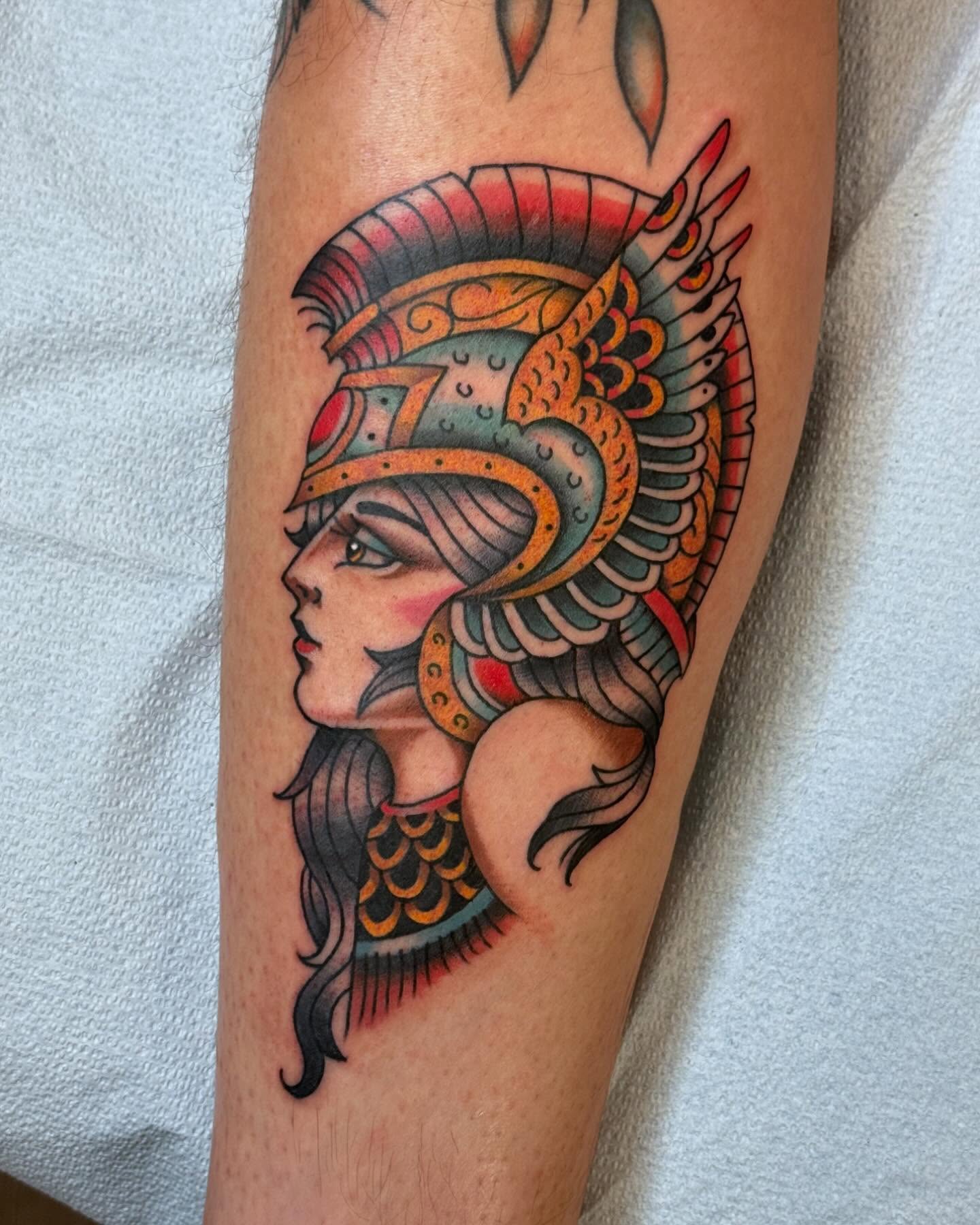 Woman with headdress American traditional tattoo on the forearm by Dave Shurman