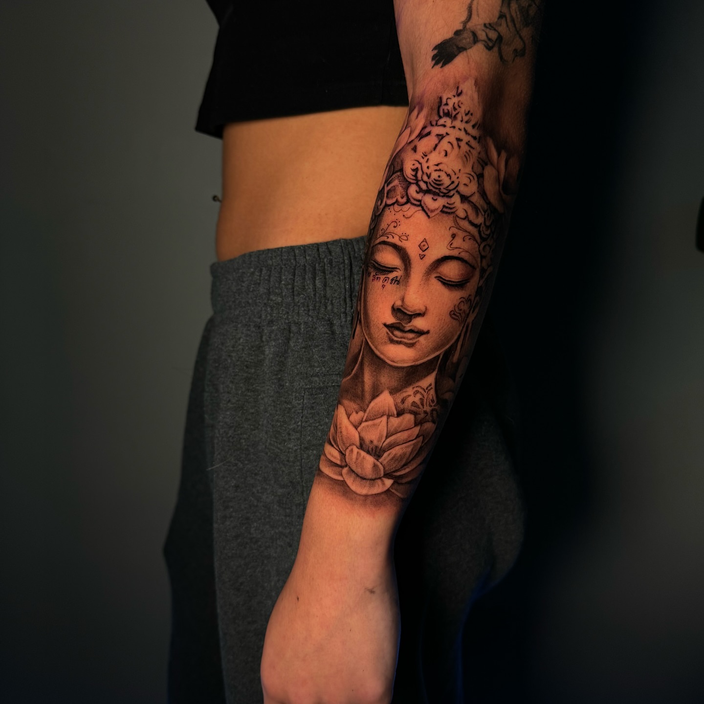 Lotus flower realism tattoo on the forearm by Isiah Hall, Whittier, California