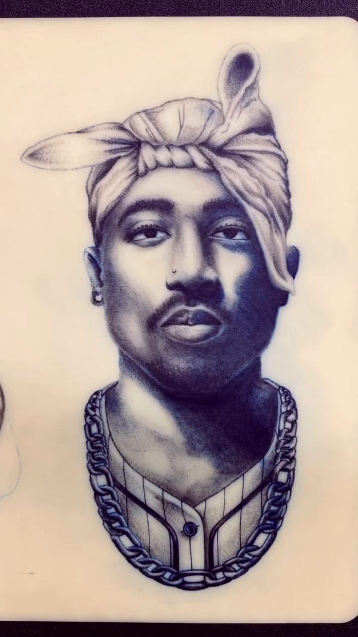 Portrait of Tupac Shakur realism tattoo by Tiffany