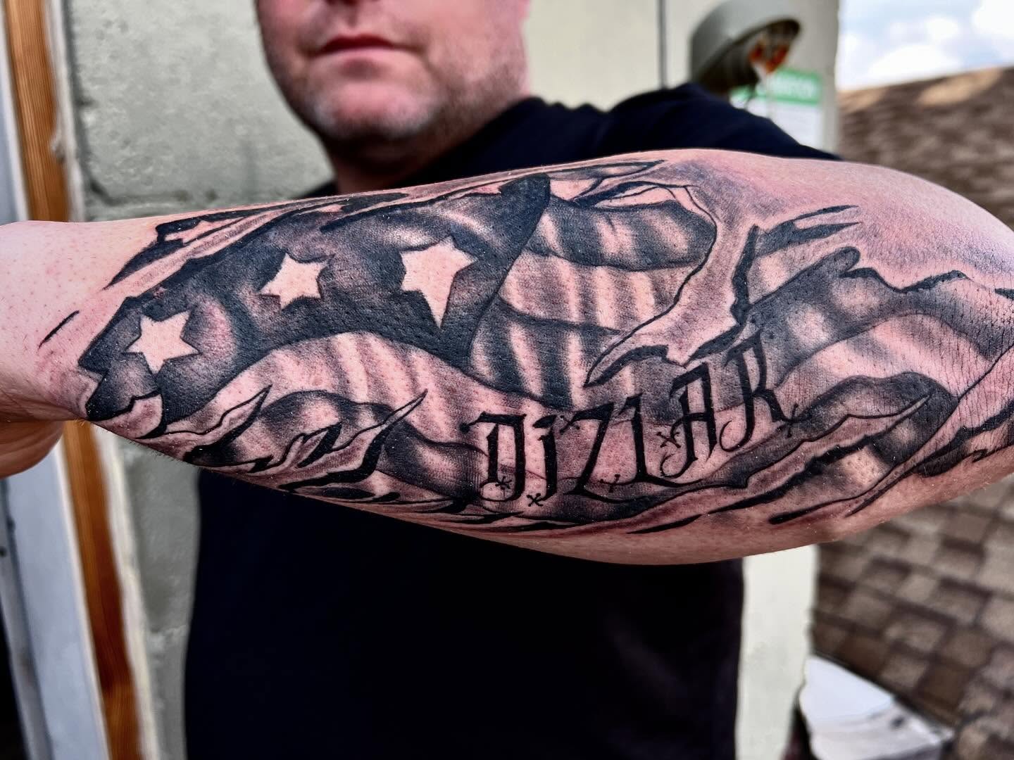 American flag American traditional tattoo on the forearm by Lucky Valenzuela, Lakewood, Colorado