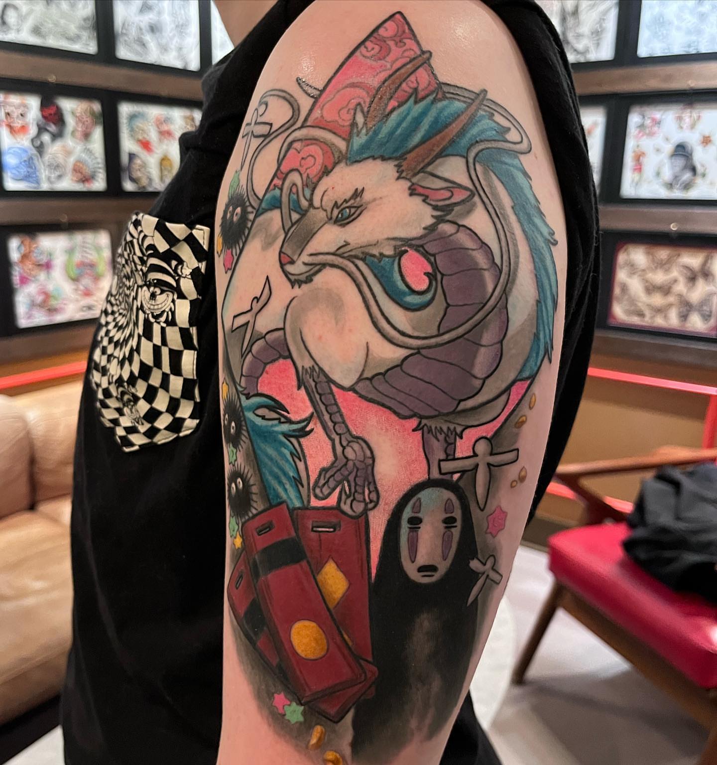 Anime-inspired creature anime tattoo on the forearm by Erick Campion