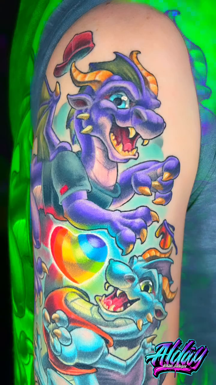Dragons and a rainbow heart new school tattoo by Albuquerque Tattoo Artist, Albuquerque, New Mexico