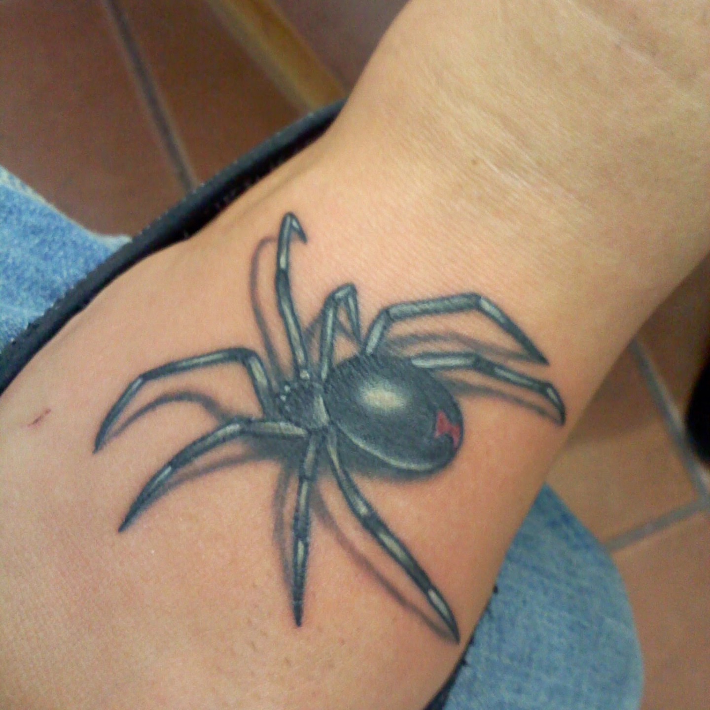 Spider realism tattoo on the forearm by @thedevilspaintbrush_