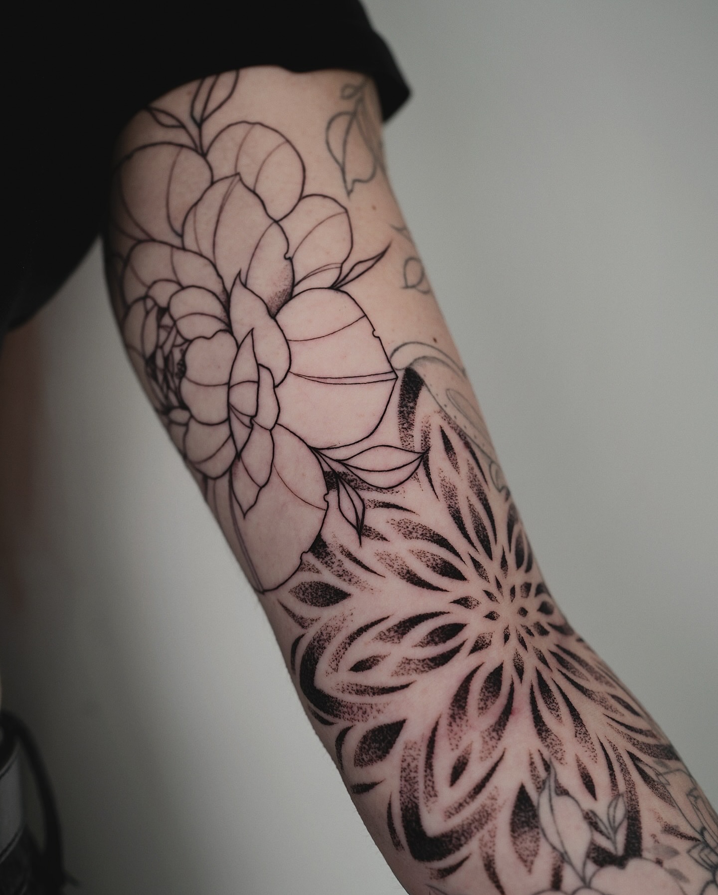 Lotus flowers dotwork tattoo on the forearm by @katuvetattoo