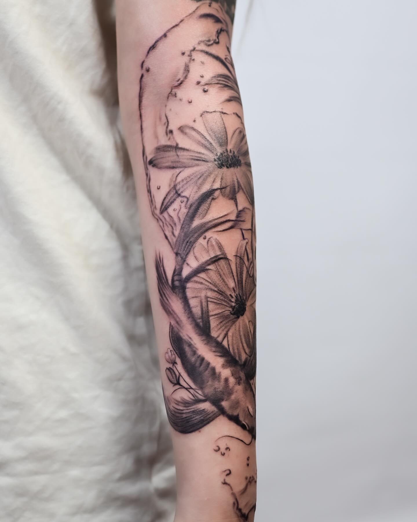 Flower dotwork tattoo on the forearm by Banky