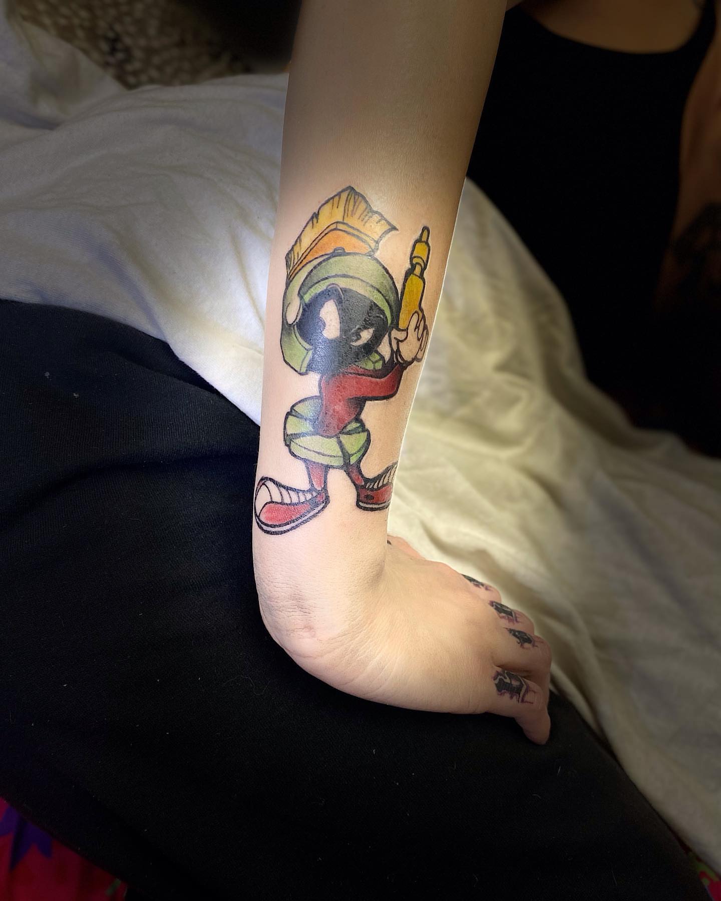 Marvin the martian illustrative tattoo on the forearm by Gabriel Lawton