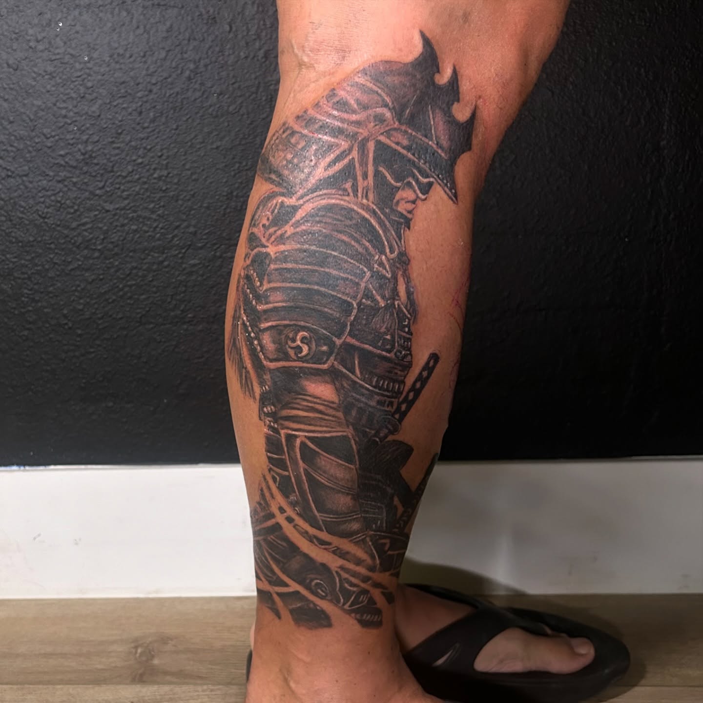 Samurai armor realism tattoo on the calf by Haley