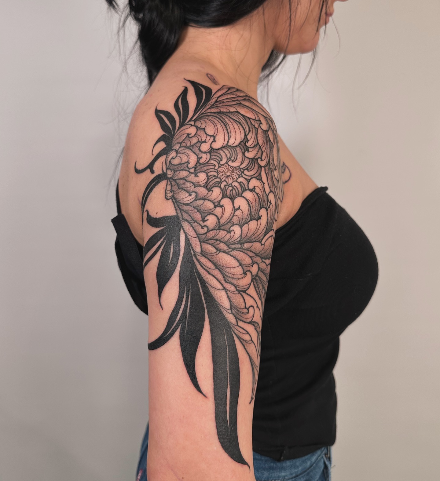 Chrysanthemum black and grey tattoo on the shoulder by abigail 🌸