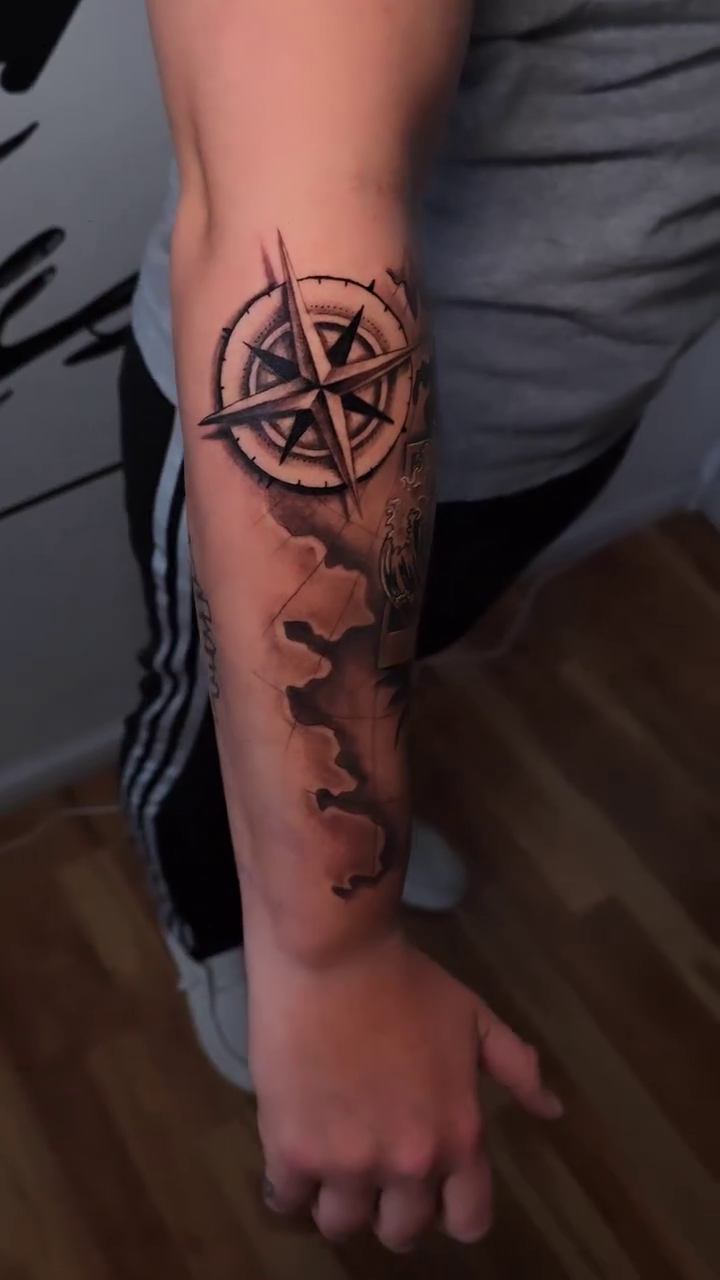 Compass and waves realism tattoo by Camuel Whaley