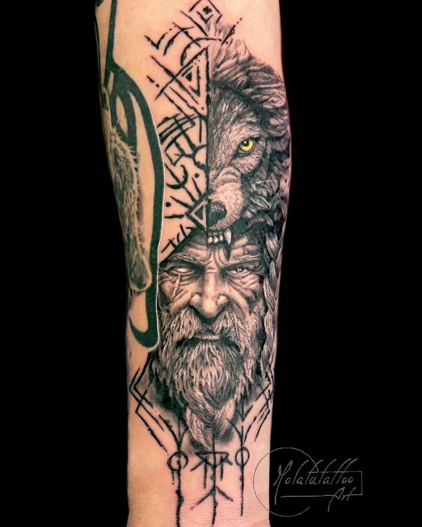 Wolf and man realism tattoo on the forearm by Molatutattoo