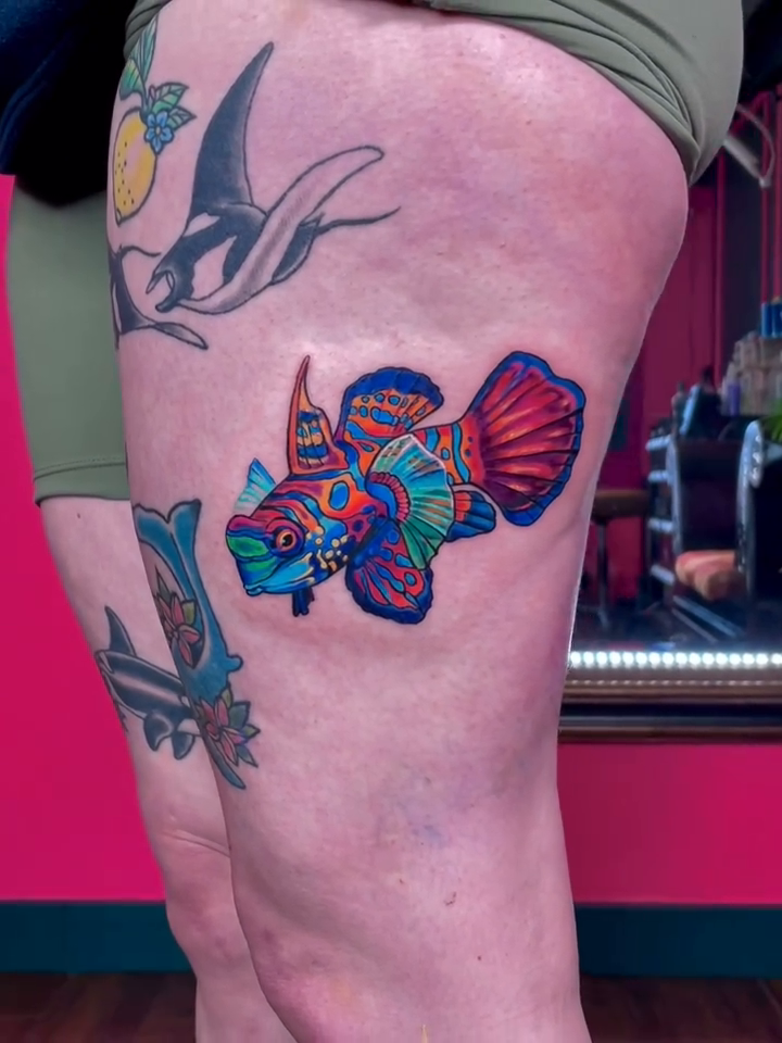 Mandarin fish neo-traditional tattoo by Sienna Coppa