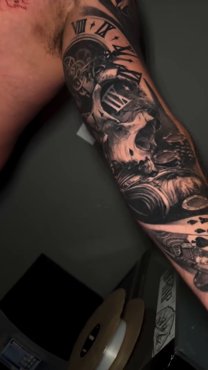 Skull and clock sleeve realism tattoo by Raul Ugarte, Roseville, California