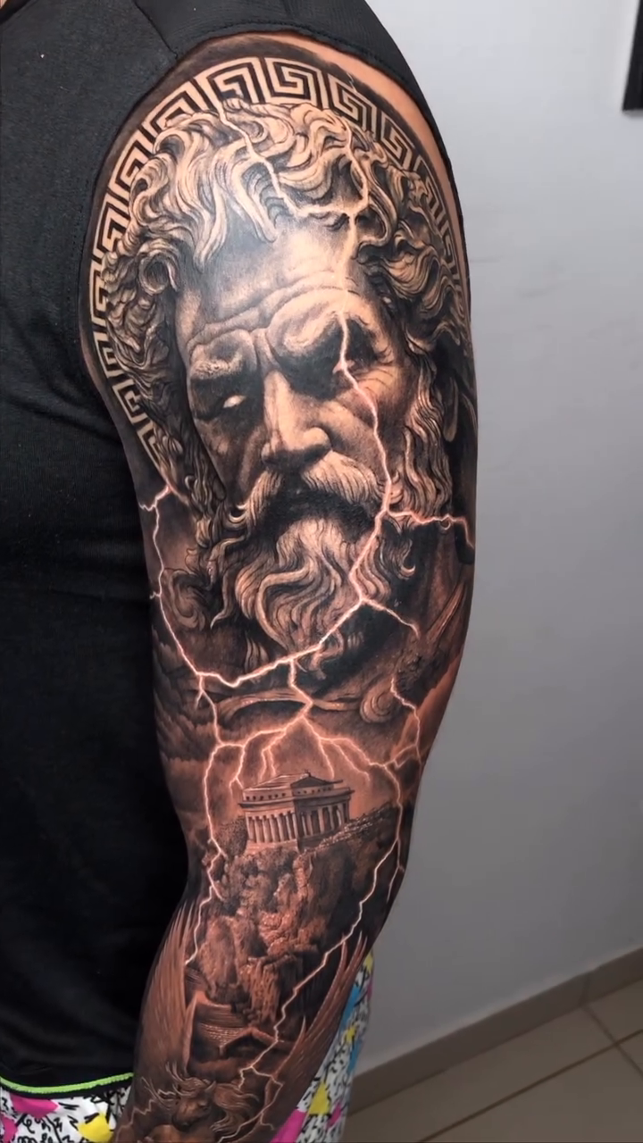 Tattoo by @elmertattoo1 — realism, black_and_grey