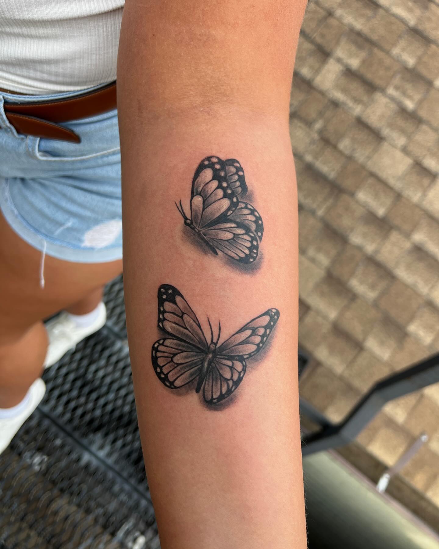 Butterflies realism tattoo on the forearm by Lucky Valenzuela, Lakewood, Colorado