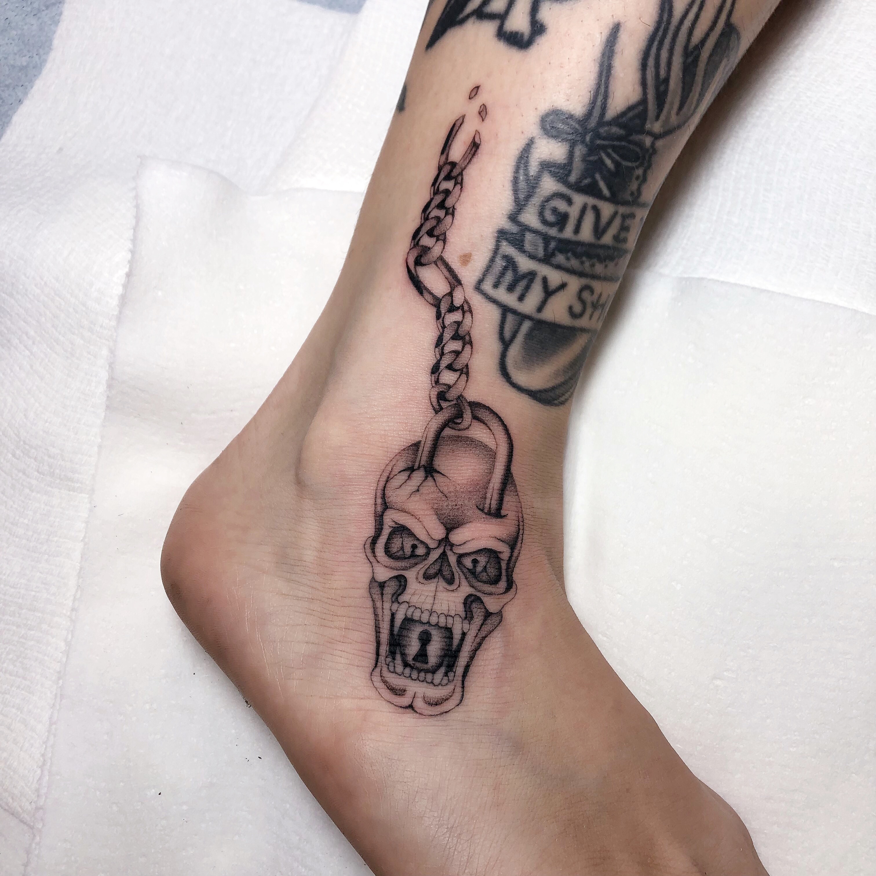Tattoo by @mickeyycarlisle — black_and_grey